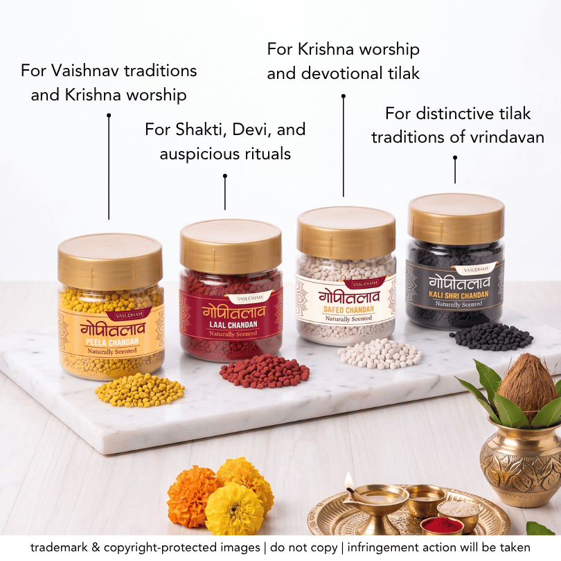Four jars of vasudham chandan tilak with yellow caps arranged on marble plate with different color chandan tilak inside