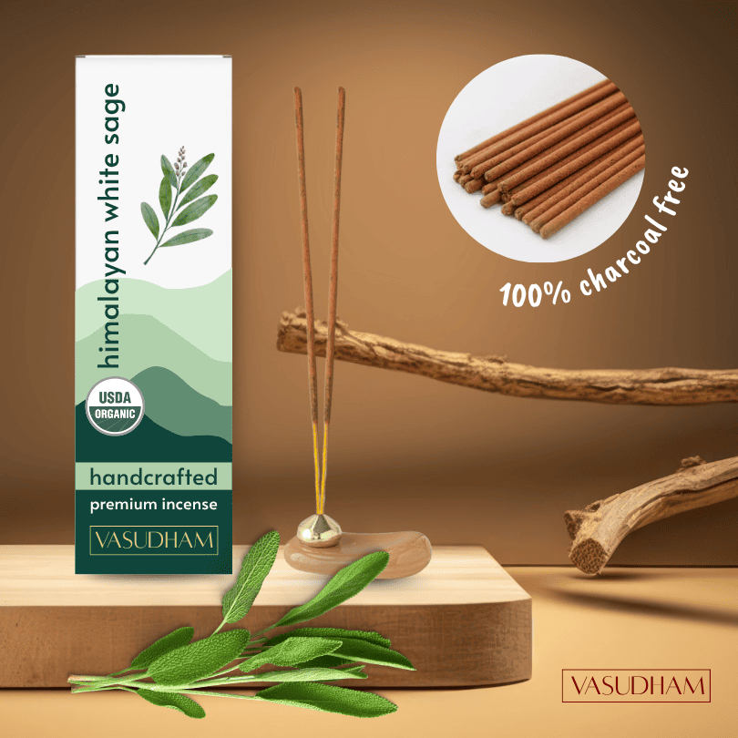 Himalayan white sage incense packaging with incense sticks and leaves on a wooden platform.