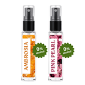 Two clear glass perfume spray bottles with black pumps on a white background. The left bottle is labeled 'AMBROSIA' with an orange honey-like floral design and a green '0% alcohol' badge.