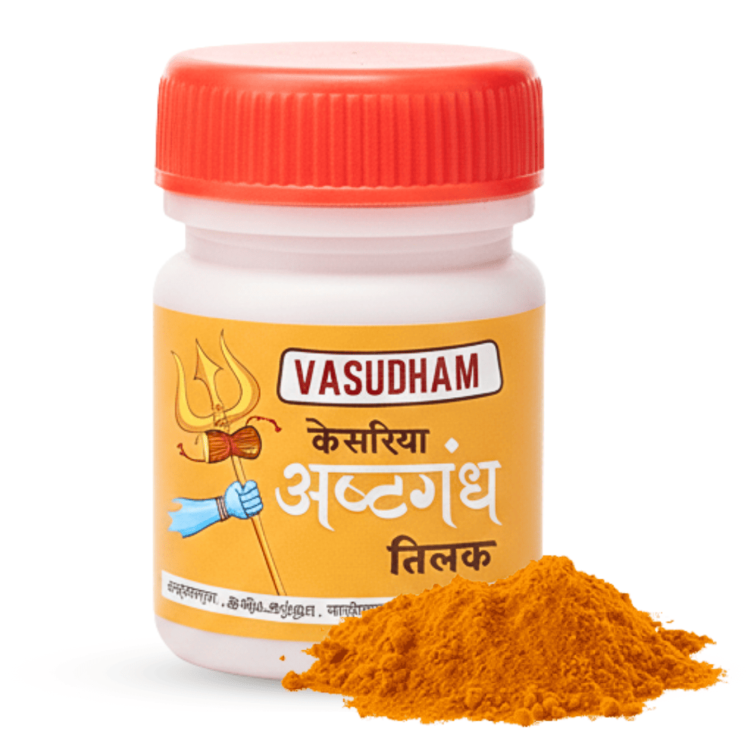 A white plastic bottle of Vasudham Kesarya Aastgandh Tilak with a bright orange-red cap and a yellow-orange label, shown with a small pile of orange-red powder in front on a white background.