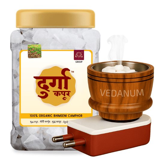 Jar of organic camphor with a wooden burner and electrical plug on a white background
