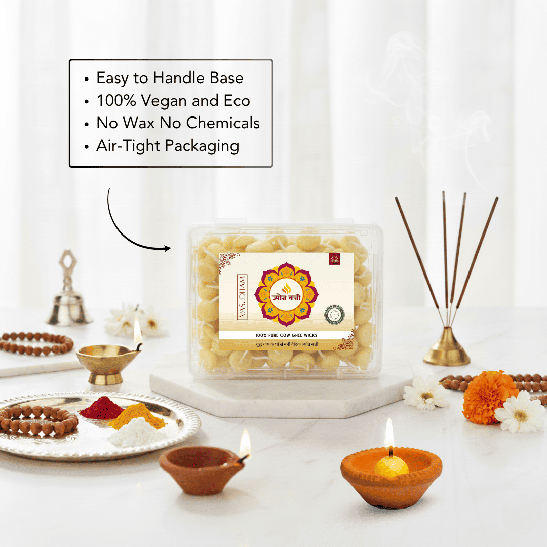 A clear plastic tub of yellow wax melts with a decorative label sits on a white marble slab, surrounded by warm decorative props including brass incense sticks, lit clay oil lamps, flowers, and a small tray with powders. A text callout lists product benefits: easy to handle base, 100% vegan and eco, no wax no chemicals, air-tight packaging.