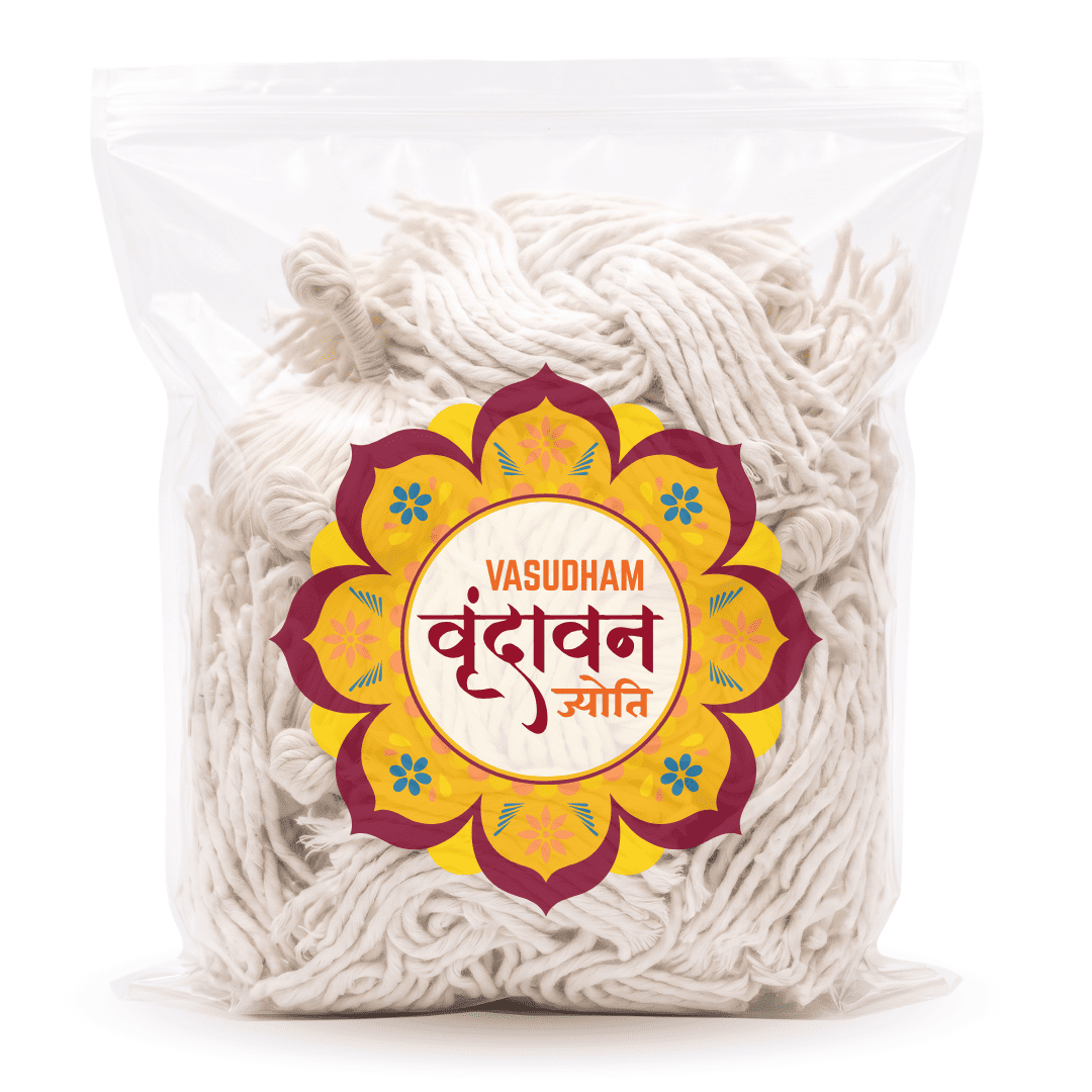 A clear plastic bag filled with off-white cotton thread, featuring a colorful circular label in the center with the text 'VASUDHAM' and Devanagari script, set against a plain white background.