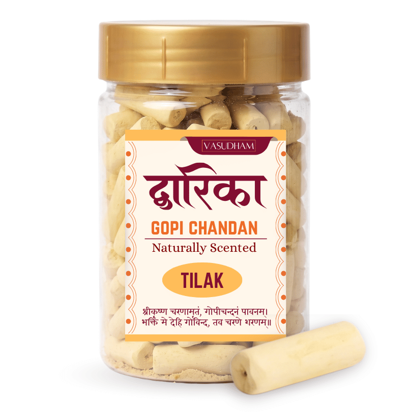 Pet jar with yellow cap and vasudham gopi chandan pieces inside and dwarika chandan written on label