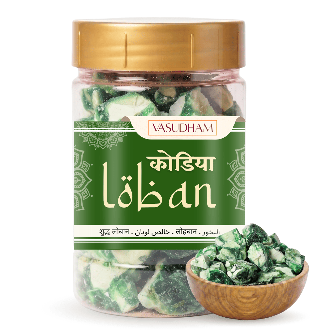 A clear plastic jar of Vasudham Kodiya loban with a gold lid and green label, shown alongside a small wooden bowl filled with the green loban on a white background.