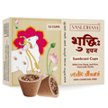 Vasudham Sambrani Cups box with illustrated cow and floral design, showing two prepared herbal cups in front on a white background.
