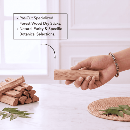 A hand holds a pre-cut wood dry stick over a white marble table, with other wood sticks and green leaves arranged nearby. A text box at the top left reads: 'Pre-Cut Specialized Forest Wood Dry Sticks.