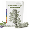 Vasudham Himalayan Sage smudge bundle set, featuring a white product box with sage green illustrations and a bundle of dried sage sticks tied with string, shown on a white background with a few loose sage leaves and purple lavender sprigs in the foreground.