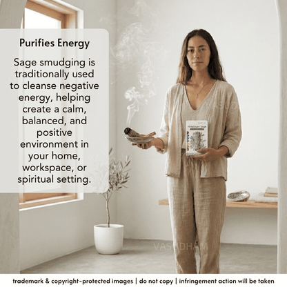 A woman in a beige linen outfit stands indoors holding a smoking sage smudge stick and a box labeled 'Purifies Energy'. A large text panel on the left explains the benefits of sage smudging, with a decorative plant and a bench in the softly lit room.