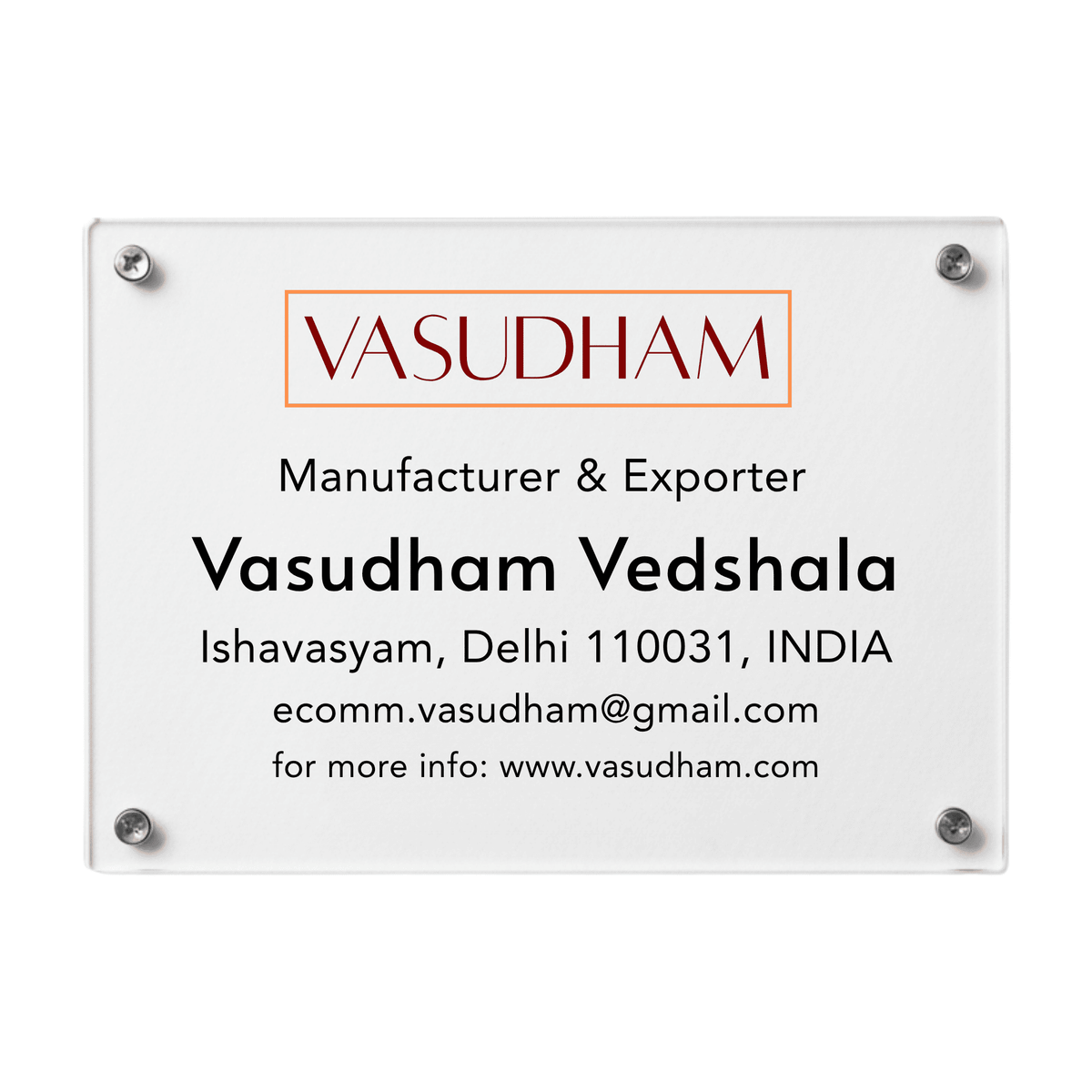 Clear acrylic sign with Vasudham branding and contact information on a white background