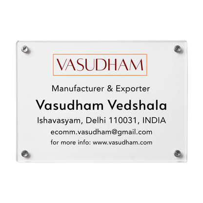 Clear acrylic sign with Vasudham branding and contact information on a white background
