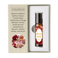 Vasudham Kesar Gold 8ml rollerball oil in its original packaging, featuring a beige textured box with rose and saffron illustrations next to the white inner box containing the amber glass bottle.