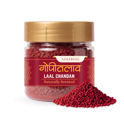 Jar with yellow lid of vasudham label with red chandan tilak inside with text naturally scented