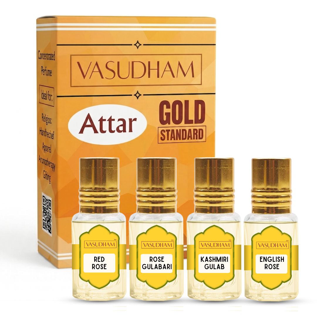 Four small perfume bottles labeled Red Rose, Rose Gulabari, Kashmiri Gulab, and English Rose, displayed in front of their orange and gold Vasudham Attar Gold Standard box on a white background.
