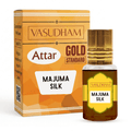 Vasudham Attar Gold Standard Majuma Silk perfume oil shown with its orange and gold retail box and a small glass bottle with a gold cap on a white background.