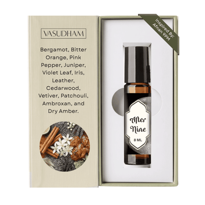Vasudham Merine 8ml essential oil bottle presented in its open packaging box, featuring a beige exterior with scent notes and a circular botanical illustration, and a white interior holding the bottle.