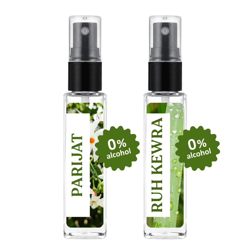 Two clear glass perfume spray bottles with black atomizers, labeled 'PARIJAT' and 'RUH KEWRA', each with a green '0% alcohol' badge overlay, on a plain white background.