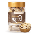 Jar of Vasudham Ayurvedic product with gold lid and clear container on a white background