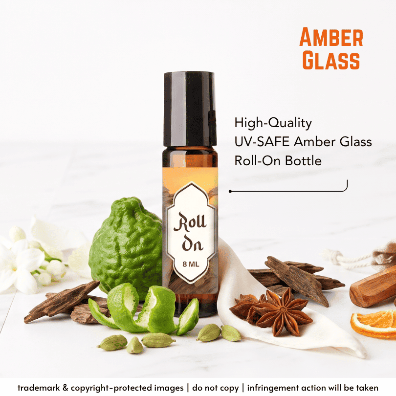 An 8 mL amber glass roll-on bottle with a black cap and a cream label reading 'Roll On 8 ML,' shown on a white surface with citrus, cinnamon, star anise, cardamom, and orange slices around it. Text on the image says 'AMBER GLASS' and 'High-Quality UV-SAFE Amber Glass Roll-On Bottle.