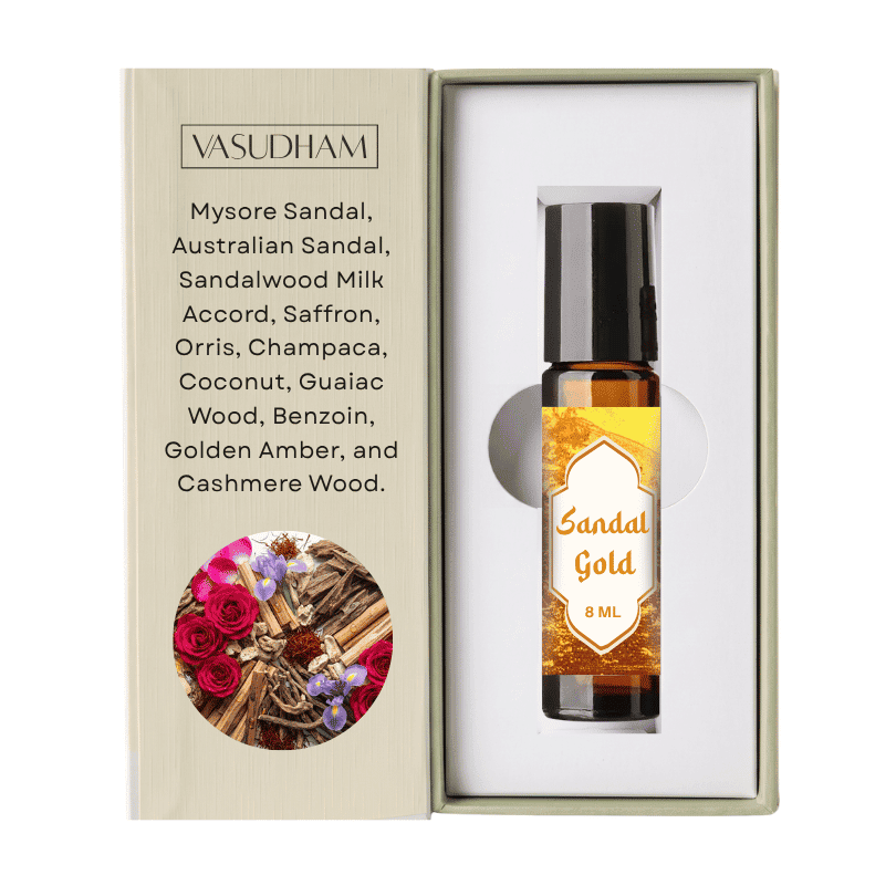 A 8 ml bottle of Vasudham Sandal Gold essential oil roll-on, displayed inside its open presentation box next to its printed packaging insert.