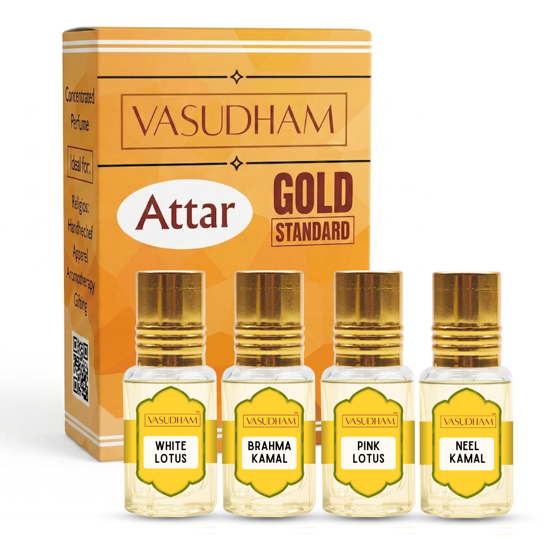 Vasudham Attar Gold Standard perfume set, featuring a golden-orange retail box behind four small glass spray bottles labeled White Lotus, Brahma Kamal, Pink Lotus, and Neel Kamal.