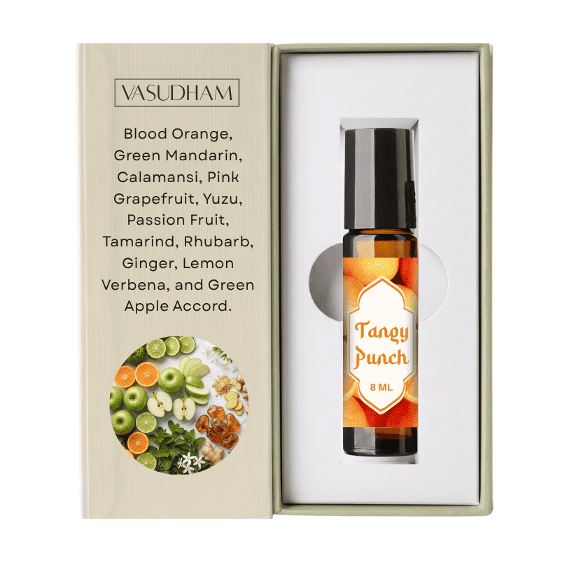 Vasudham Tangy Punch 8ml essential oil roller bottle presented in its gift box. The box features a light beige textured cover listing various citrus and fruit scents, and the open white interior showcases the amber glass bottle with a black cap and a vibrant orange label.