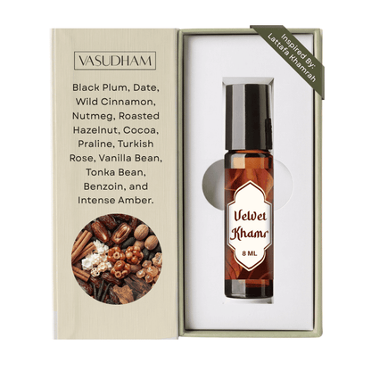 Vasudham Velvet Khamr 8ml essential oil roller bottle presented in its open packaging box, showing the amber liquid and a list of scent ingredients.