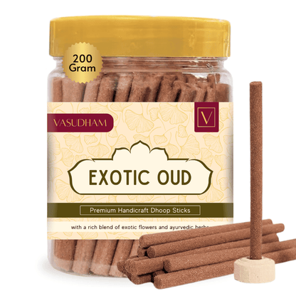 Jar of Vasudham Exotic Oud doop sticks with a few sticks displayed in front on a white background.