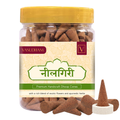Jar of Vasudham Nilgiri Dhoop Cones with a yellow lid and white label.