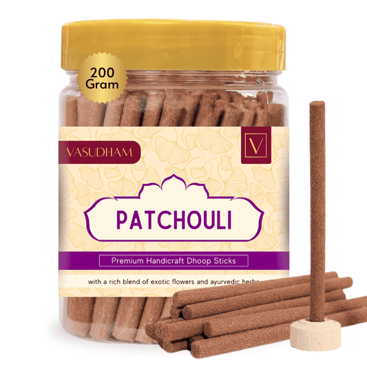 Jar of Vasudham Patchouli Dhoop Sticks with a yellow lid and visible sticks on a white background